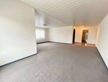 Wohnzimmer - (KI generiert) Doppeltes Wohngl�ck: Modernes Zweifamilienhaus mit vielf�ltigen Nutzungsoptionen