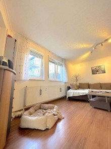 Wohnzimmer Ger�umige 3Z-Erdgeschosswohnung zum Wohlf�hlen mit Terrasse und Tiefgaragenstellplatz