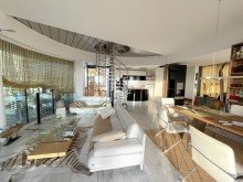 Wohnzimmer  Architektonisches Highlight: Luxus-Einfamilienhaus mit einzigartigem Design 
